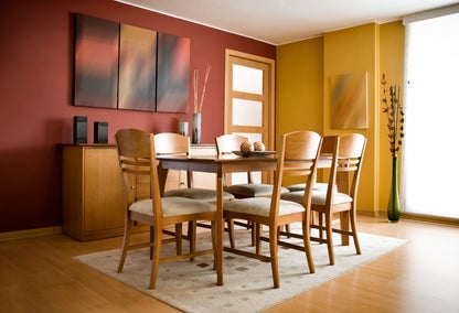 Red and yellow dining room in a home typical of South Hill, Lexington